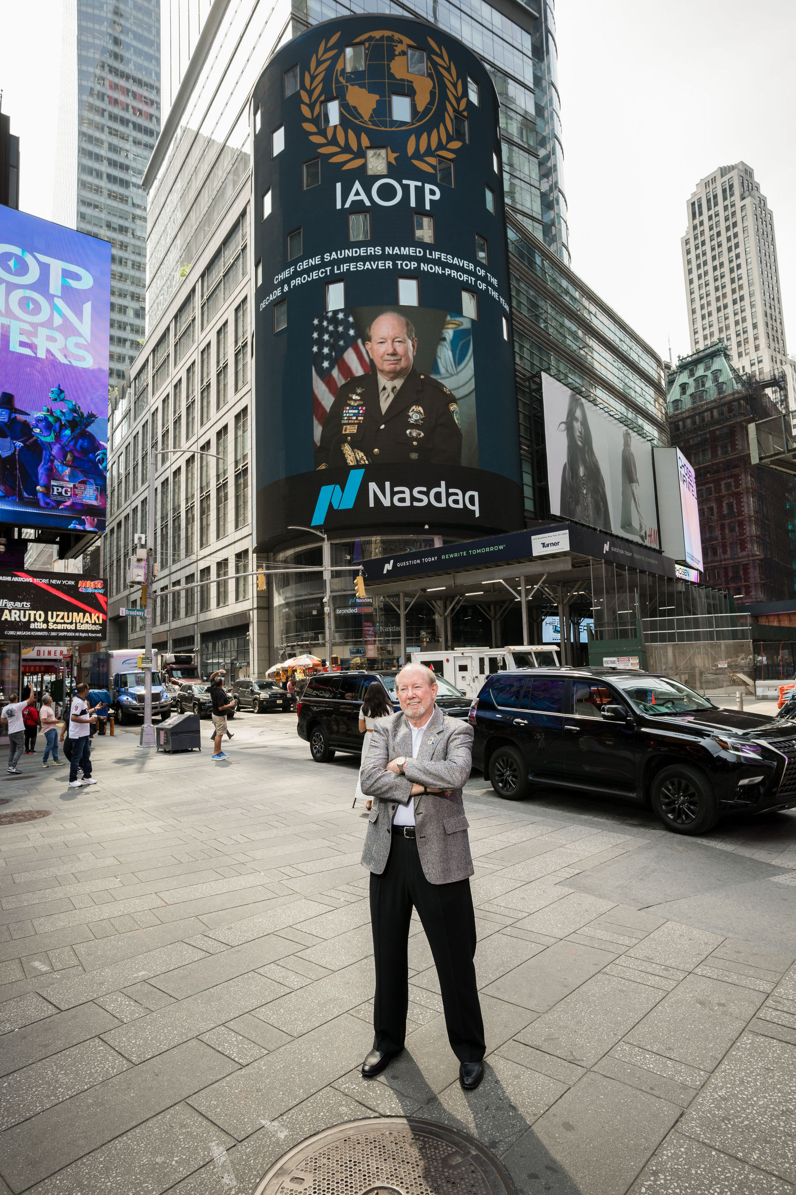 Chief Gene Saunders on the IAOTP Nasdaq Times Square billboard